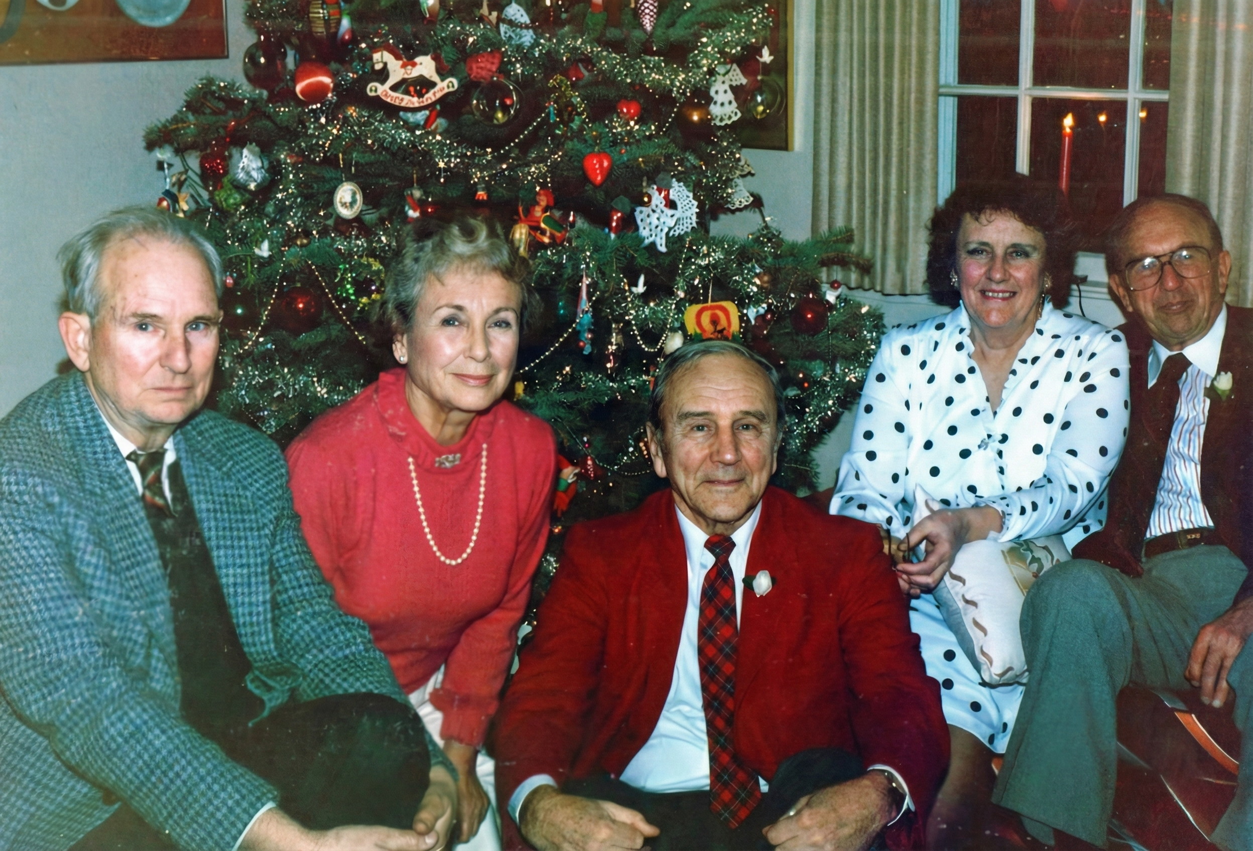 Tom, Mary, Bill, Carrie, and Forbes Rockwell around the Christmas tree, image enhanced by Gemini